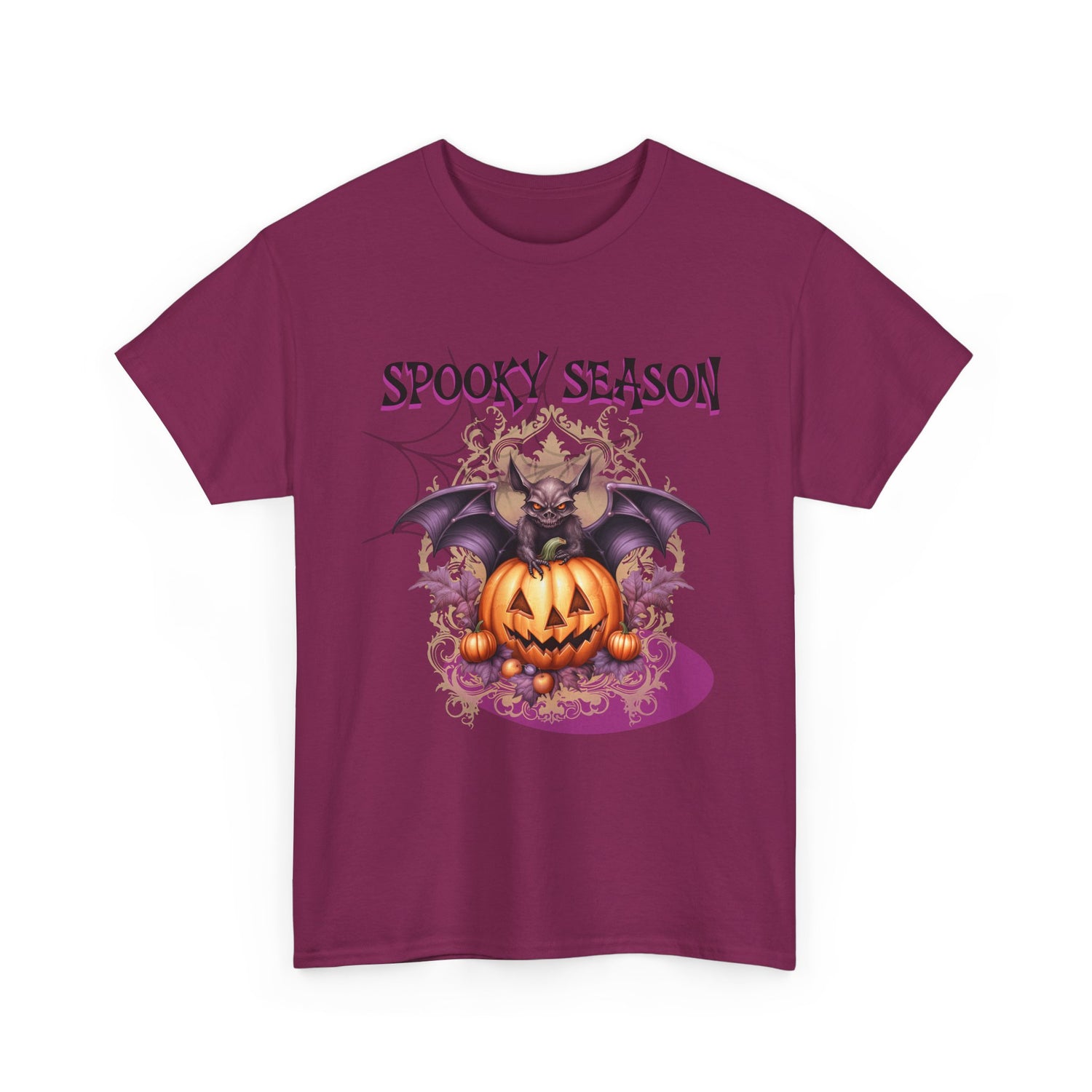 Berry t-shirt featuring a Jack-o-lantern with a bat sitting on top scroll detailing in the background. Green and purple text across top reading Spooky Season. Brilliantmischief.shop