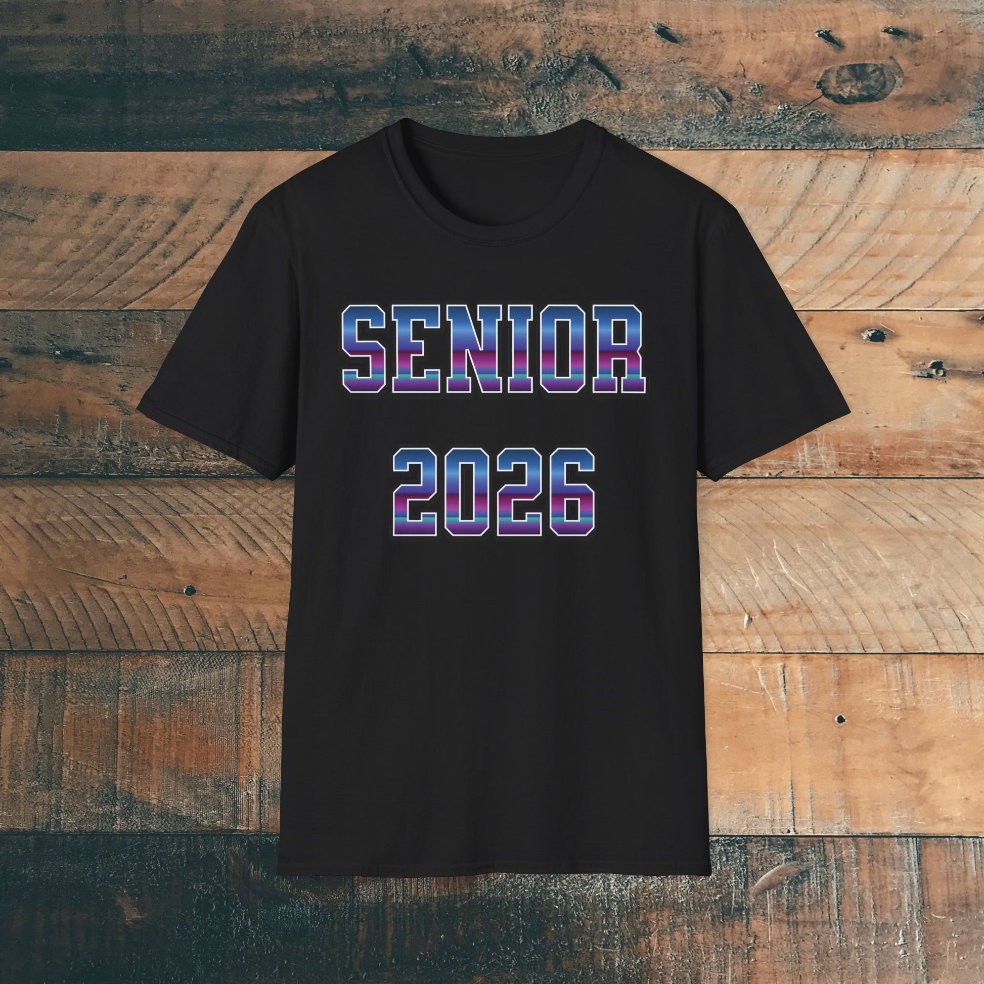 Black t-shirt with 'SENIOR 2026' in purple and blue bold text on a wooden background. Brilliantmischief.shop