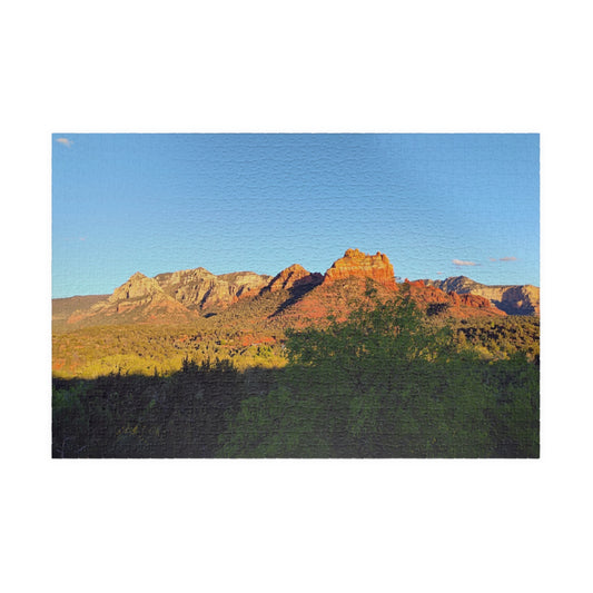 Scenic view of red rock formations with greenery under a blue sky
Brilliantmischief.shop