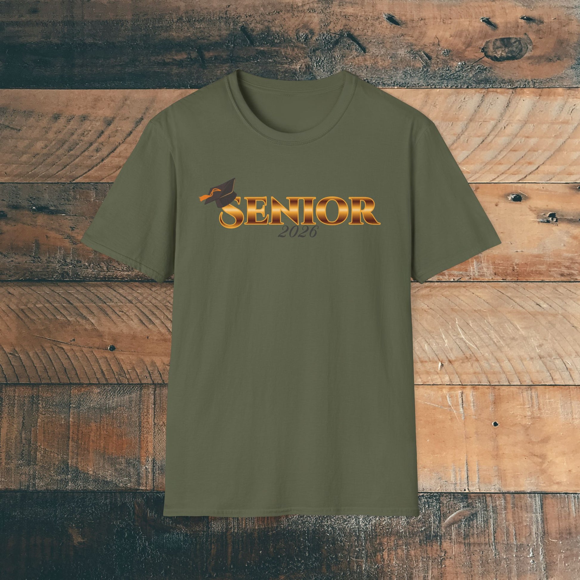 Army green t-shirt with 'Senior 2026' gold text design on a wooden background.
Brilliantmischief.shop