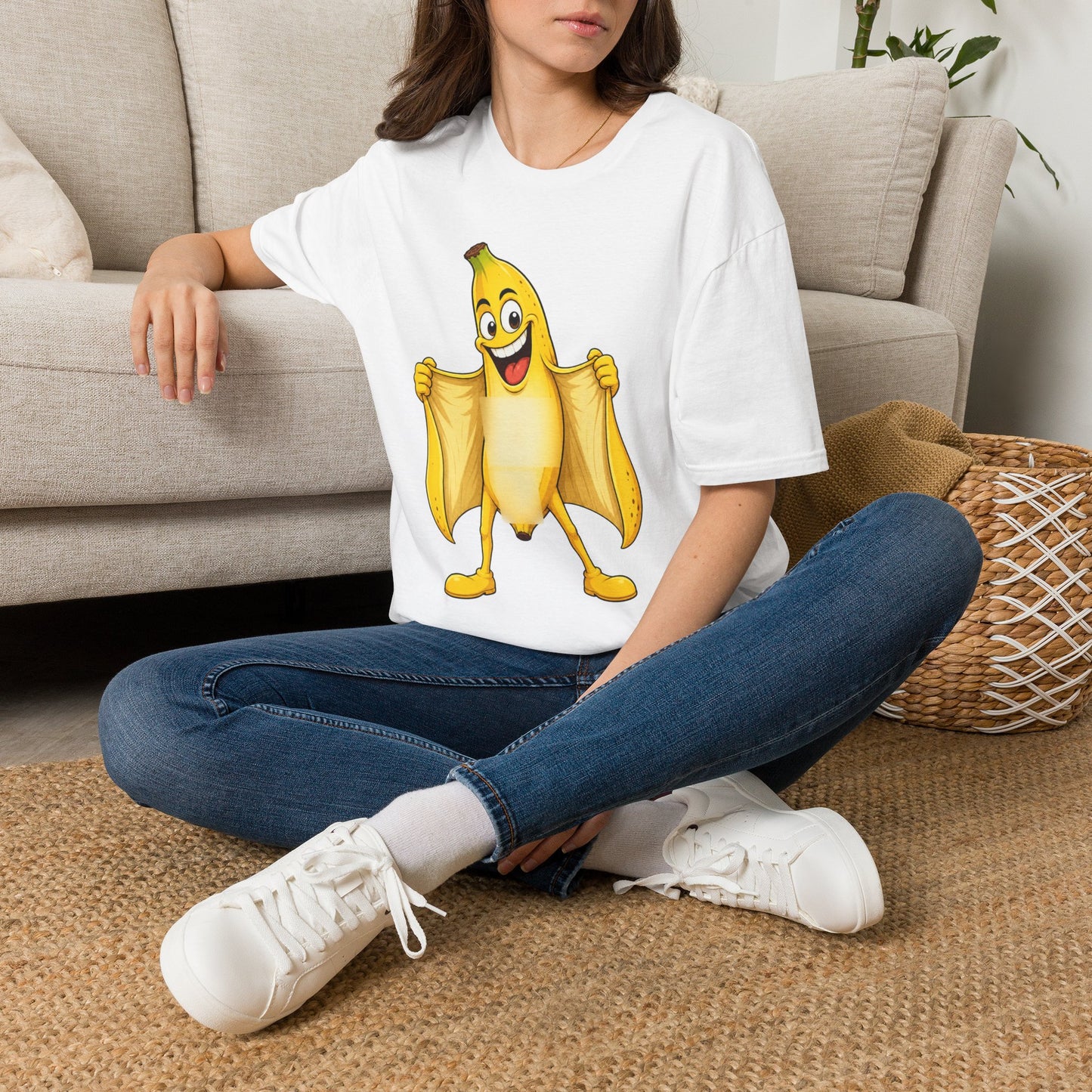 Woman wearing a white T-shirt with banana graphic with a huge smile flashing everyone with the exposed part covered with blurry blocks. Brilliantmischief.shop